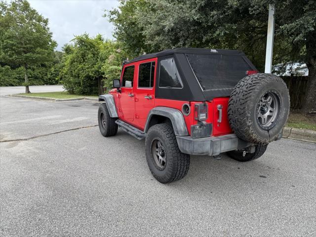 used 2015 Jeep Wrangler Unlimited car, priced at $19,409