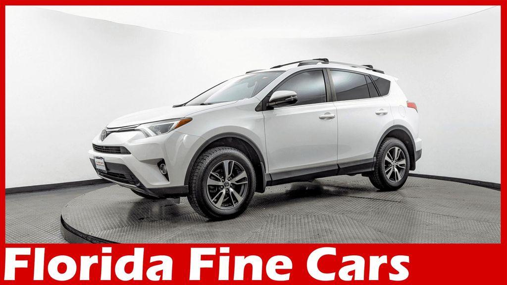 used 2018 Toyota RAV4 car, priced at $14,799