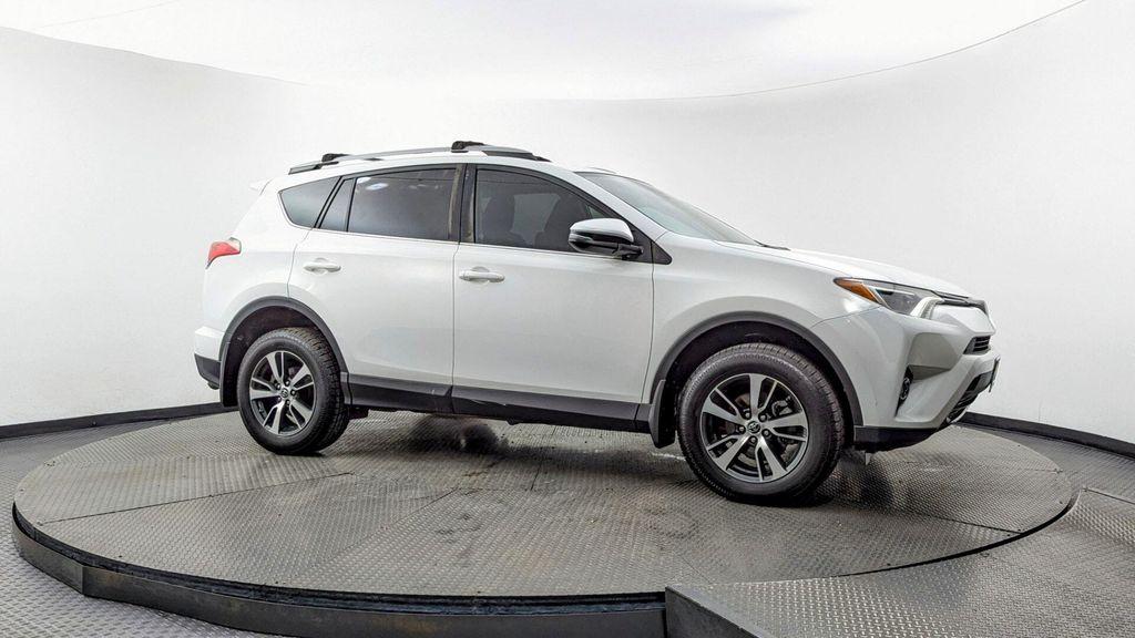 used 2018 Toyota RAV4 car, priced at $14,799