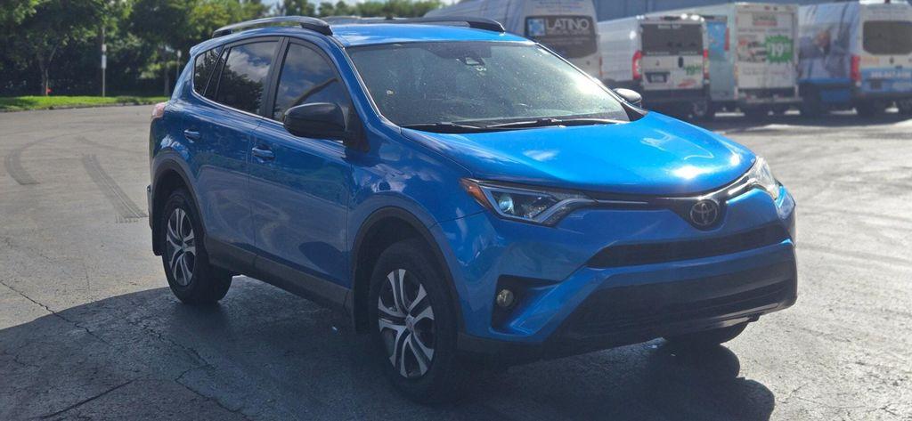 used 2018 Toyota RAV4 car, priced at $13,899