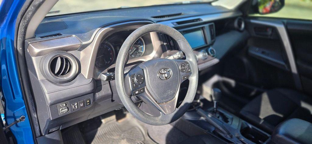 used 2018 Toyota RAV4 car, priced at $13,899