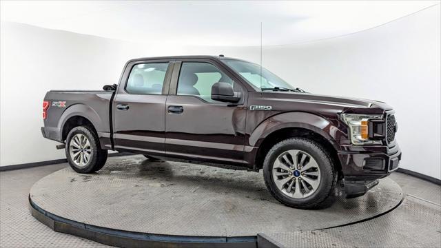 used 2018 Ford F-150 car, priced at $18,499