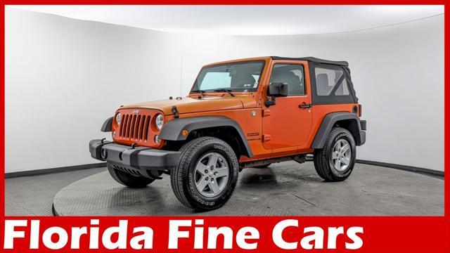 used 2015 Jeep Wrangler car, priced at $13,799