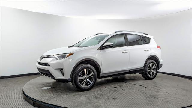 used 2018 Toyota RAV4 car, priced at $16,299