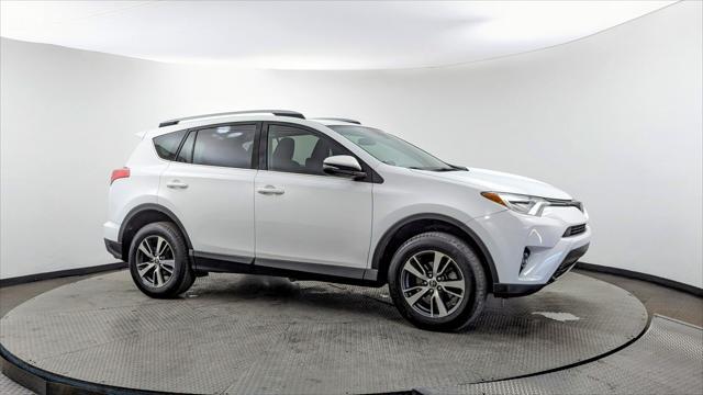 used 2018 Toyota RAV4 car, priced at $16,299