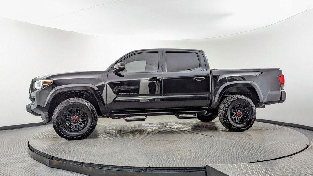 used 2022 Toyota Tacoma car, priced at $24,499