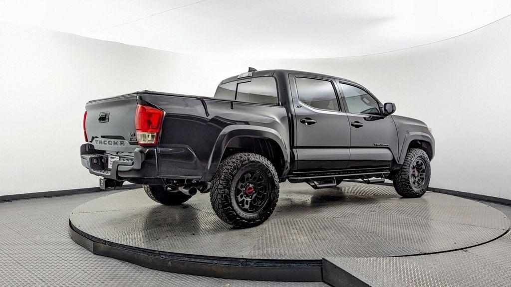 used 2022 Toyota Tacoma car, priced at $24,499