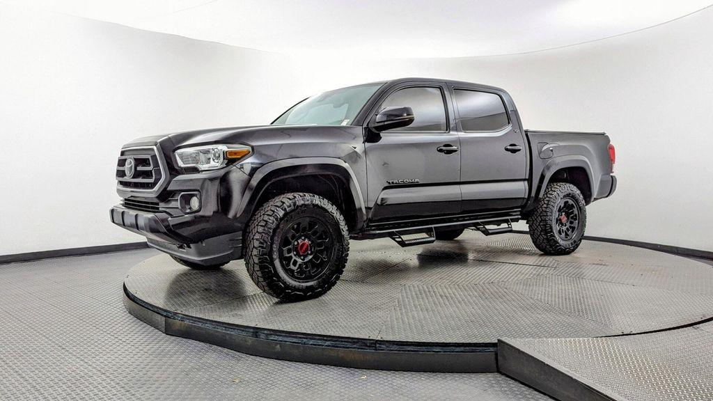 used 2022 Toyota Tacoma car, priced at $24,499