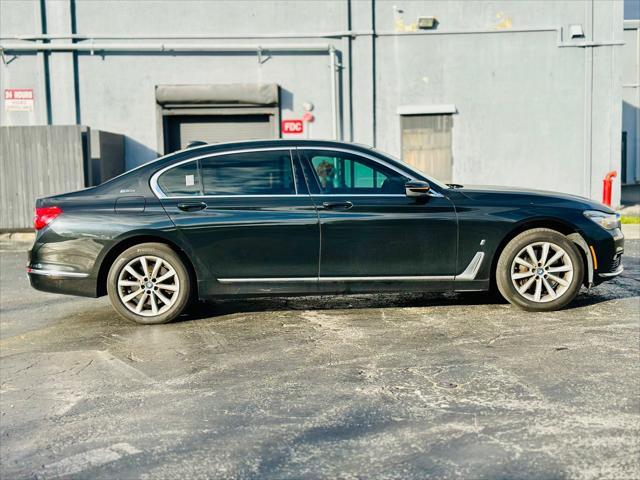 used 2017 BMW 740e car, priced at $17,999