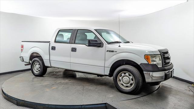 used 2014 Ford F-150 car, priced at $9,399