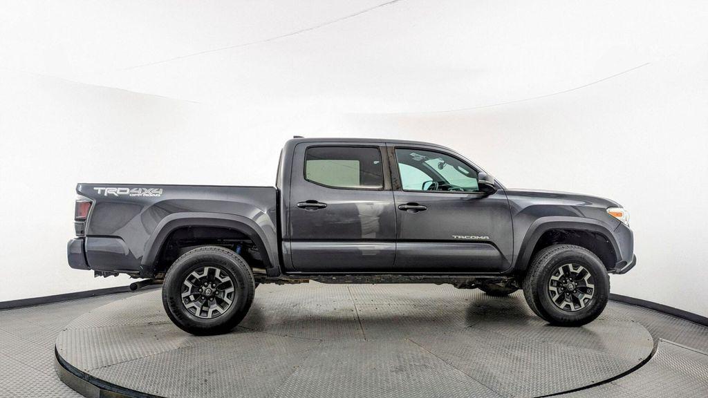 used 2020 Toyota Tacoma car, priced at $27,799
