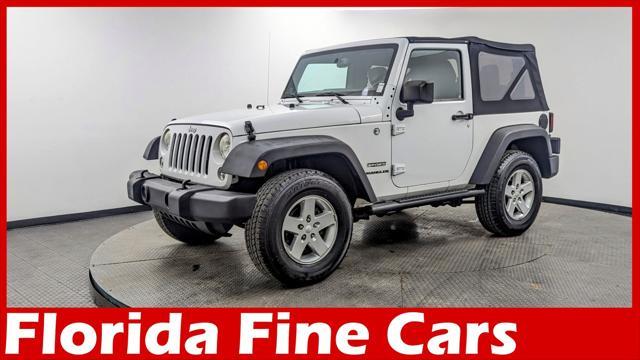 used 2014 Jeep Wrangler car, priced at $13,199