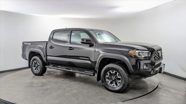 used 2021 Toyota Tacoma car, priced at $24,499