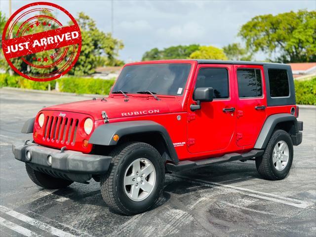 used 2010 Jeep Wrangler Unlimited car, priced at $11,799