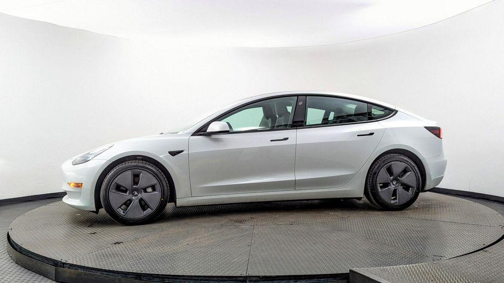 used 2023 Tesla Model 3 car, priced at $23,499
