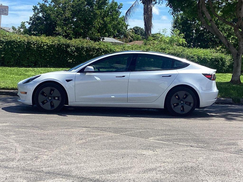 used 2023 Tesla Model 3 car, priced at $23,799