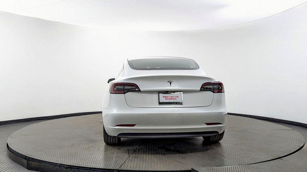 used 2023 Tesla Model 3 car, priced at $23,499