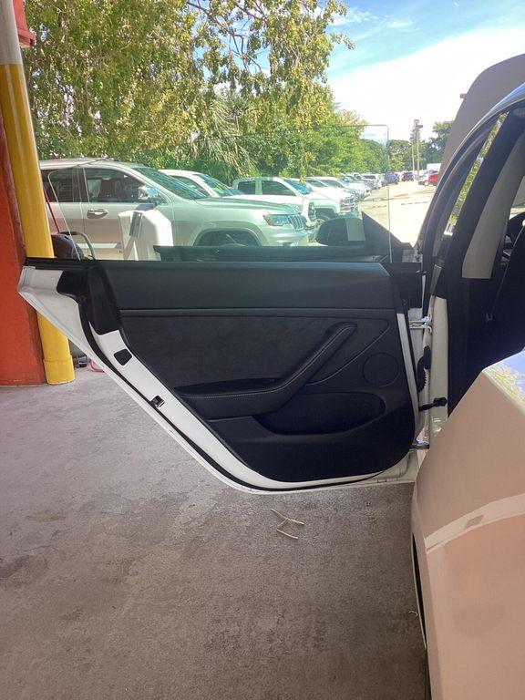 used 2023 Tesla Model 3 car, priced at $23,799