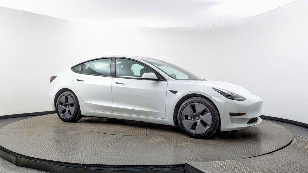 used 2023 Tesla Model 3 car, priced at $23,499