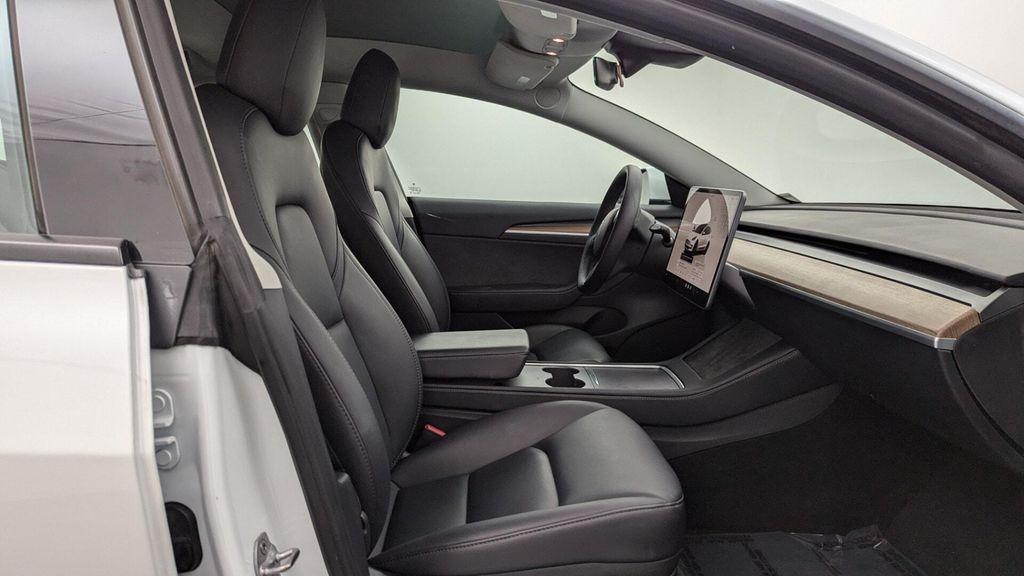 used 2023 Tesla Model 3 car, priced at $23,499