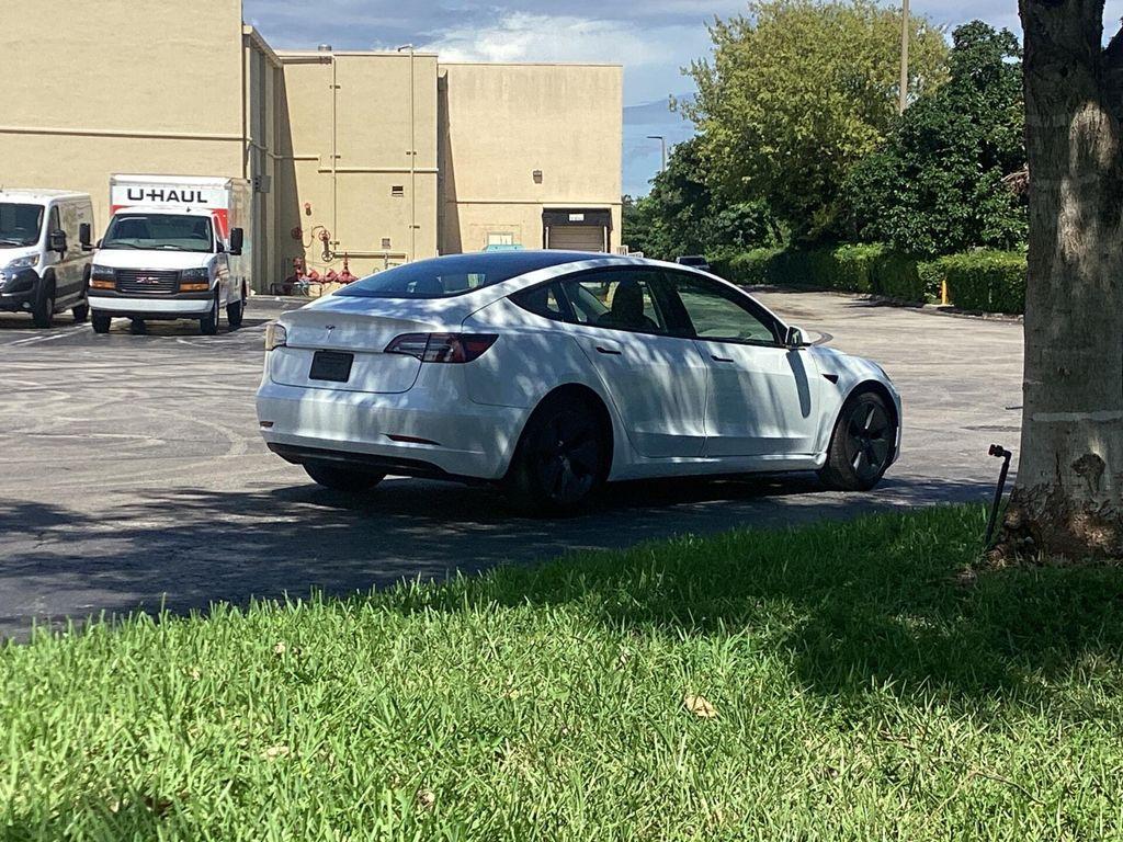 used 2023 Tesla Model 3 car, priced at $23,799