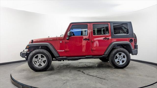 used 2010 Jeep Wrangler Unlimited car, priced at $11,799