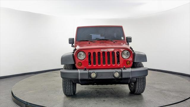 used 2010 Jeep Wrangler Unlimited car, priced at $11,799