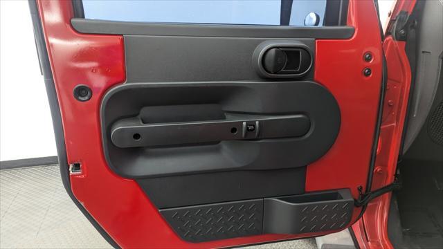 used 2010 Jeep Wrangler Unlimited car, priced at $11,799