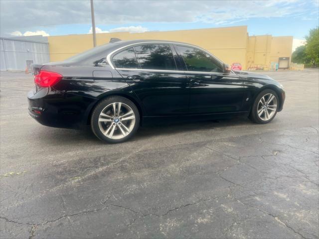 used 2018 BMW 330e car, priced at $12,999