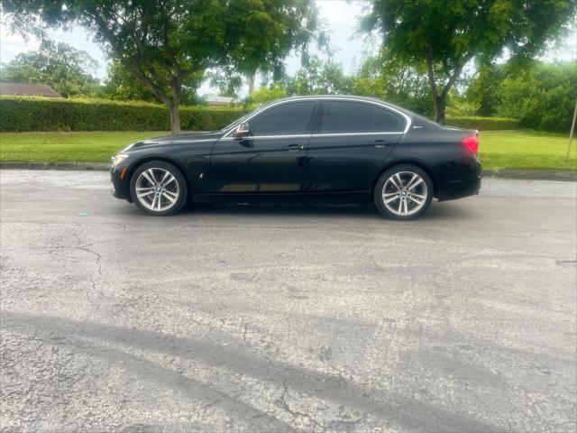 used 2018 BMW 330e car, priced at $12,999