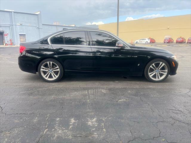 used 2018 BMW 330e car, priced at $12,999