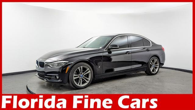 used 2018 BMW 330e car, priced at $12,999