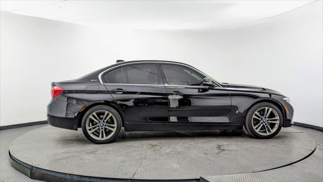 used 2018 BMW 330e car, priced at $12,999
