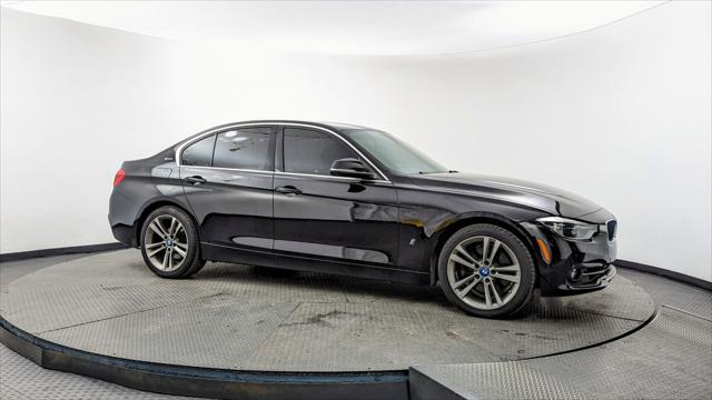 used 2018 BMW 330e car, priced at $12,999