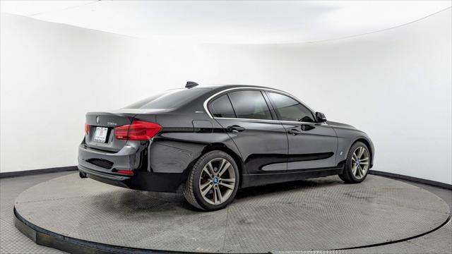used 2018 BMW 330e car, priced at $12,999