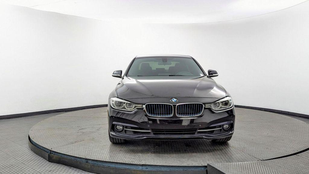 used 2018 BMW 330e car, priced at $13,199