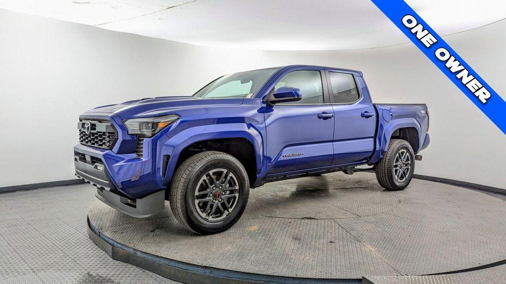 used 2024 Toyota Tacoma car, priced at $31,499