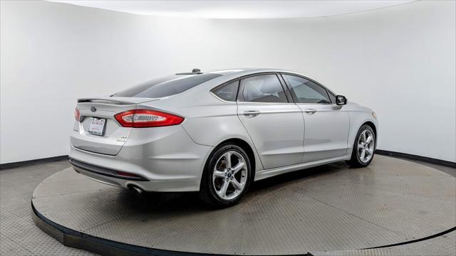 used 2016 Ford Fusion car, priced at $7,299