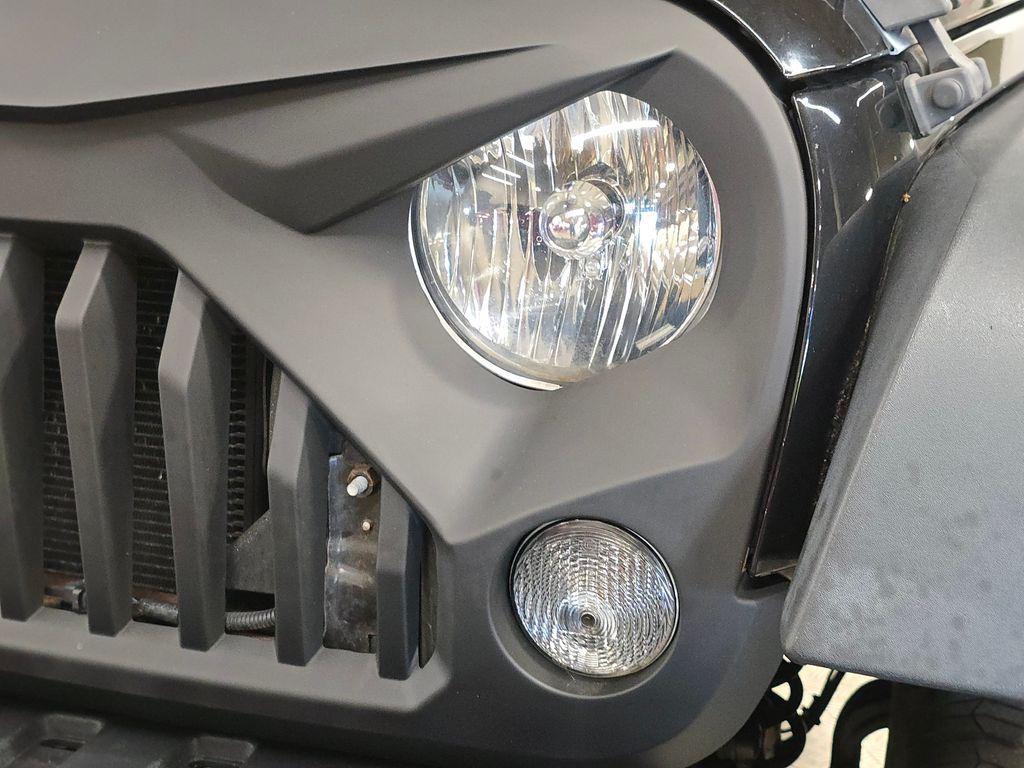 used 2016 Jeep Wrangler Unlimited car, priced at $19,289