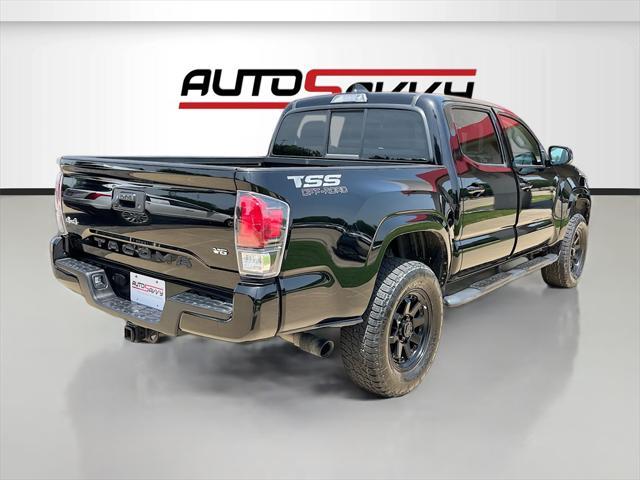 used 2023 Toyota Tacoma car, priced at $32,000