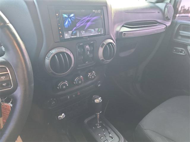 used 2015 Jeep Wrangler Unlimited car, priced at $16,549