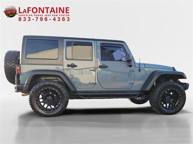 used 2015 Jeep Wrangler Unlimited car, priced at $16,549