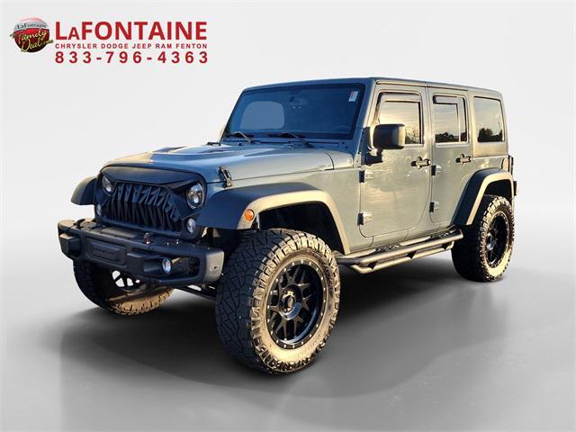 used 2015 Jeep Wrangler Unlimited car, priced at $16,549