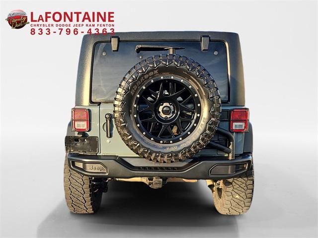 used 2015 Jeep Wrangler Unlimited car, priced at $16,549