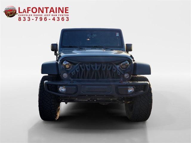 used 2015 Jeep Wrangler Unlimited car, priced at $16,549