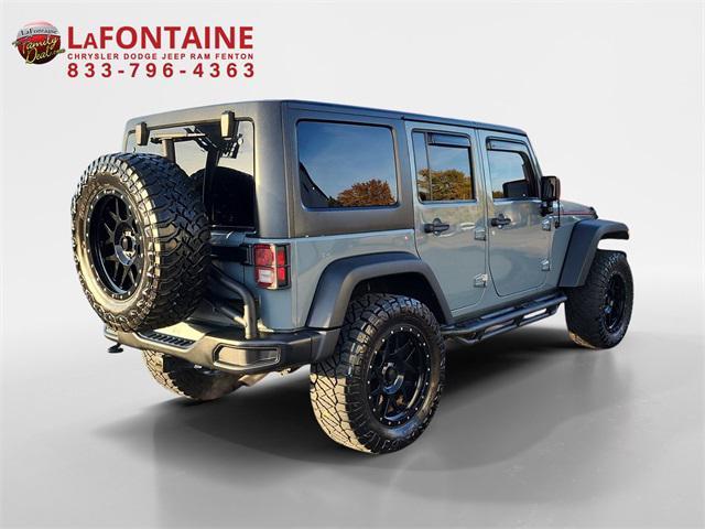 used 2015 Jeep Wrangler Unlimited car, priced at $16,549