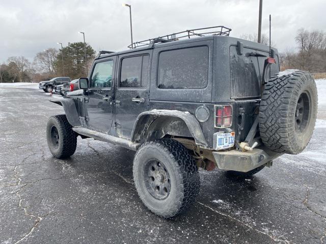 used 2012 Jeep Wrangler Unlimited car, priced at $15,283