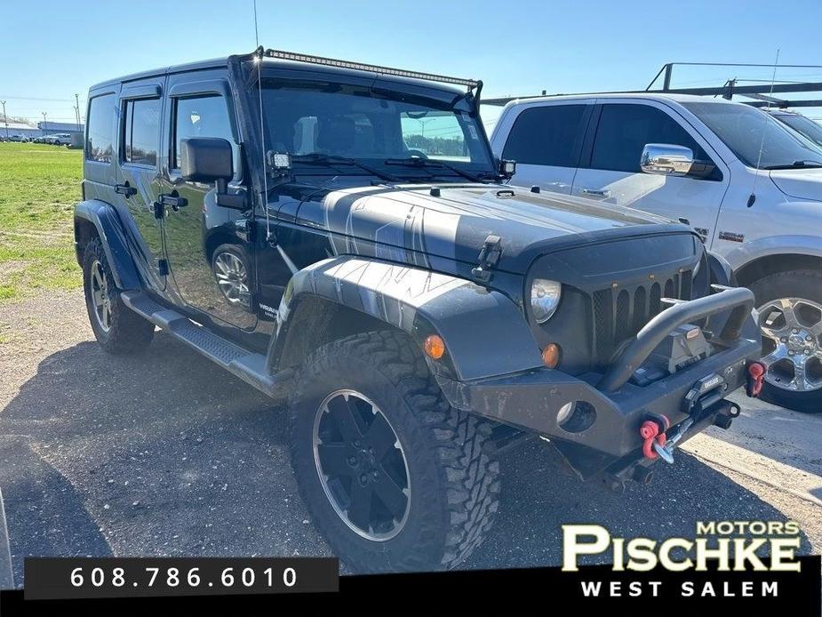 used 2012 Jeep Wrangler Unlimited car, priced at $16,988