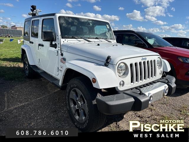 used 2018 Jeep Wrangler JK Unlimited car, priced at $23,980