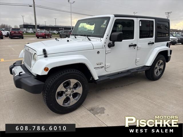 used 2018 Jeep Wrangler JK Unlimited car, priced at $23,788